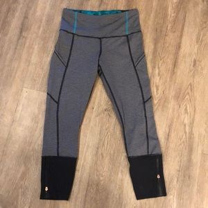 Lululemon striped leggings with rose gold zippers.